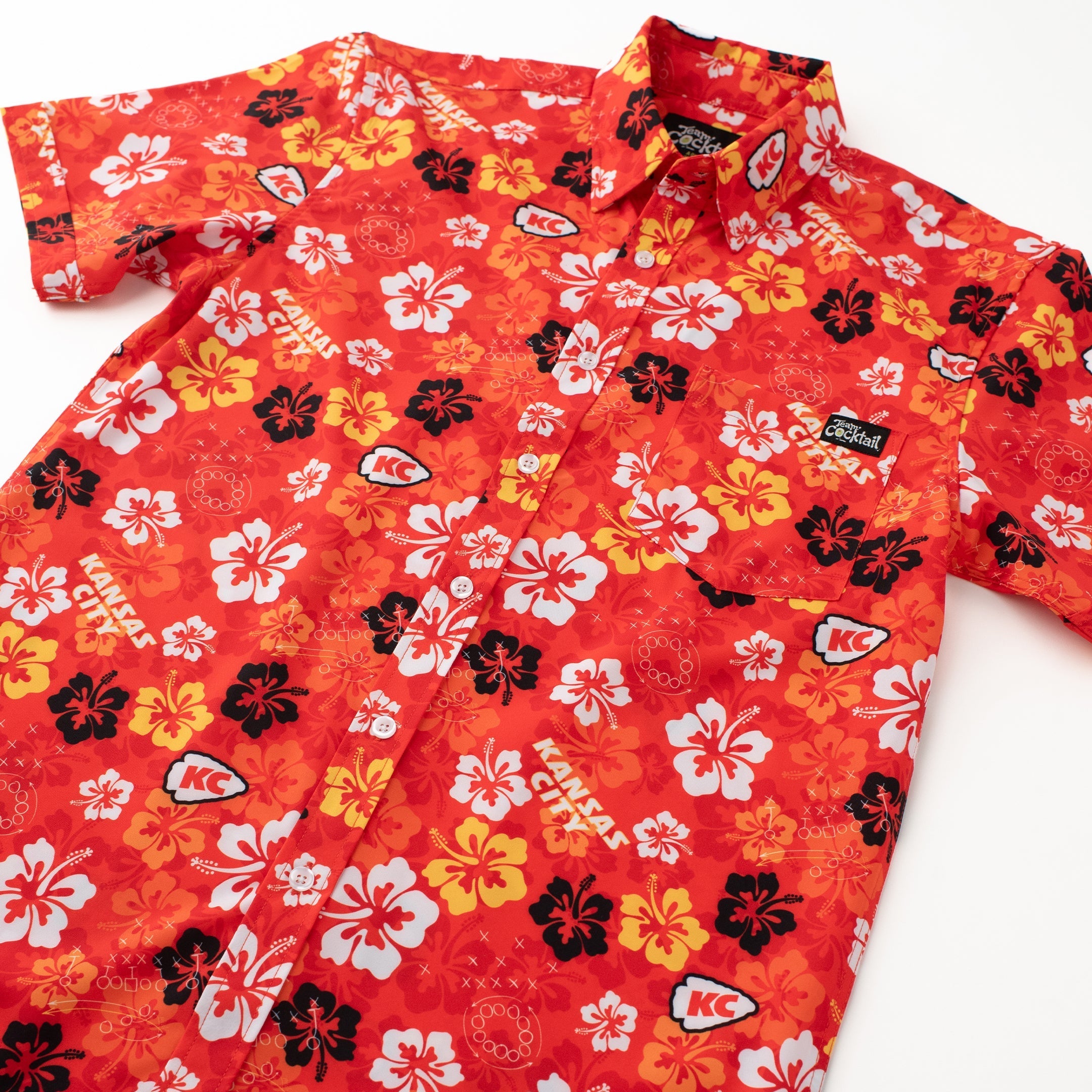 Red floral patterned shirt on a white background