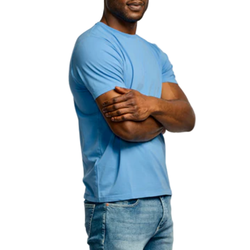 Man wearing a light blue t-shirt and jeans on a white background