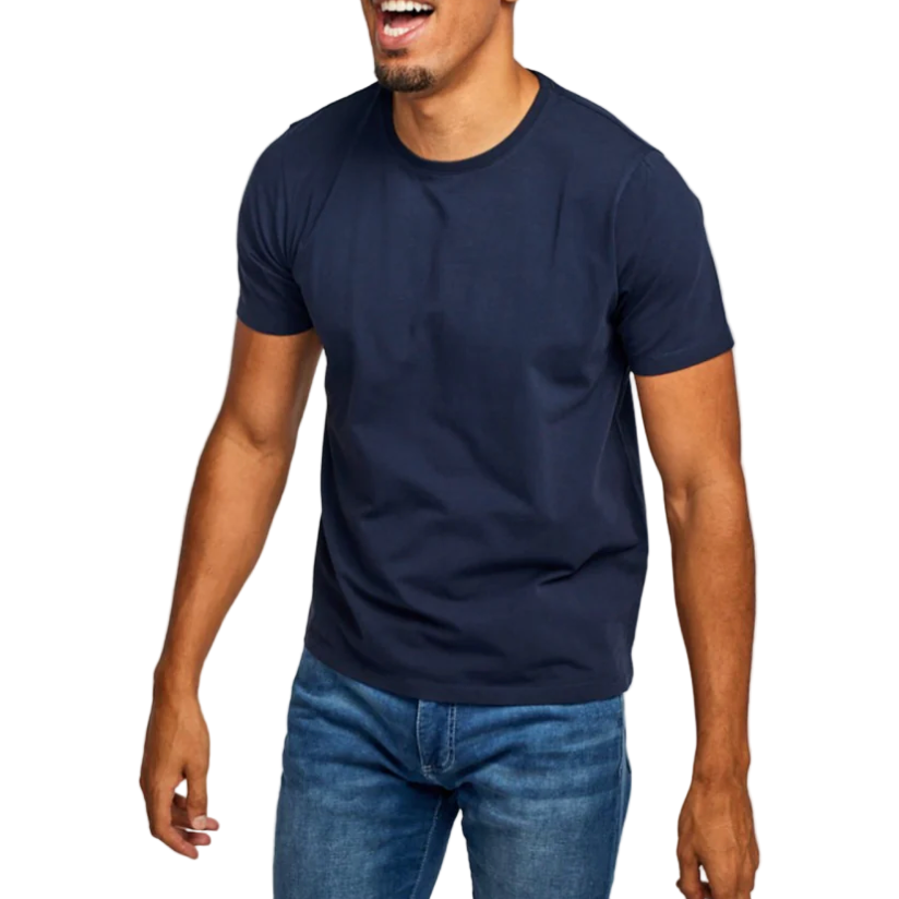 Man wearing a navy blue t-shirt and jeans on a white background