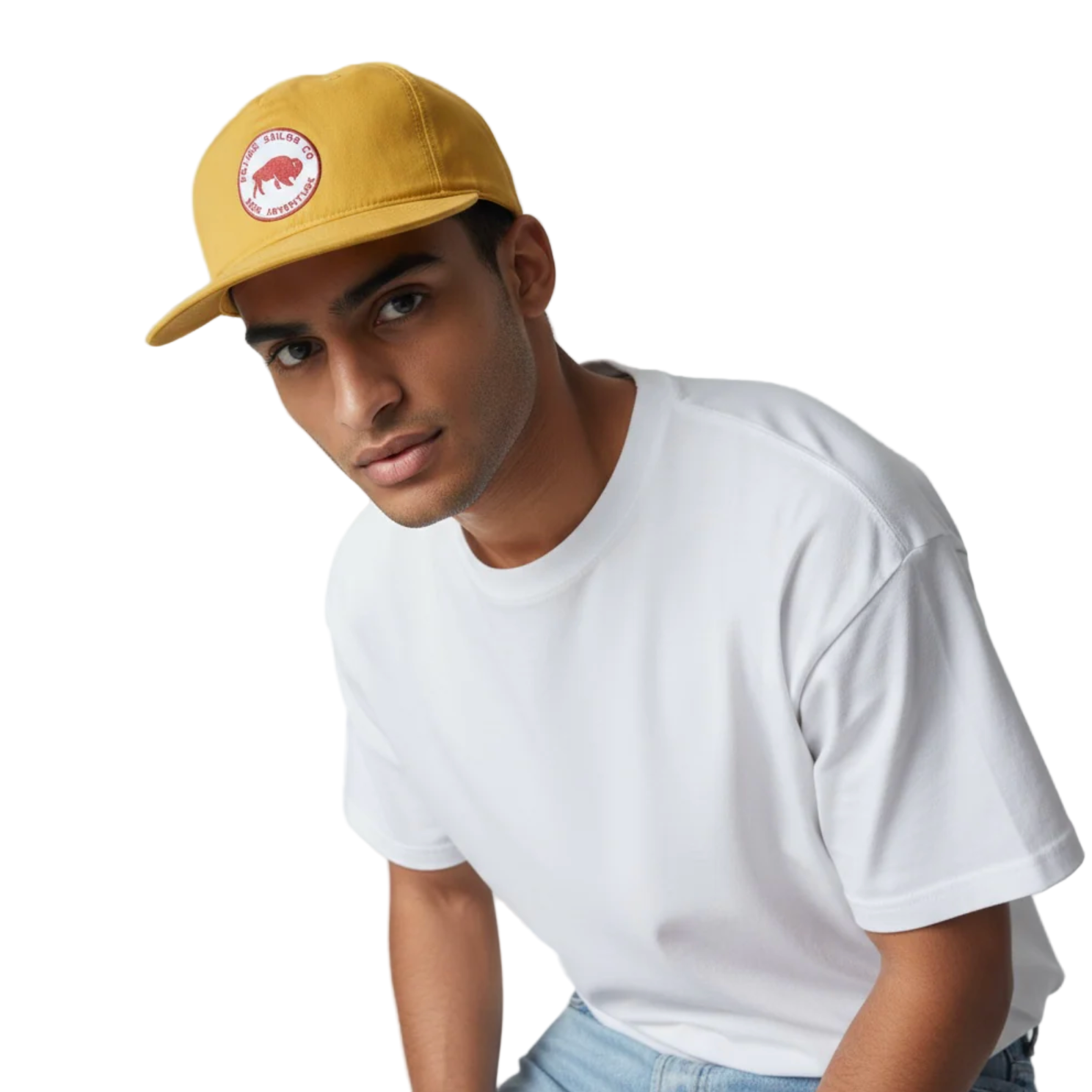Person wearing a yellow cap and white t-shirt against a white background