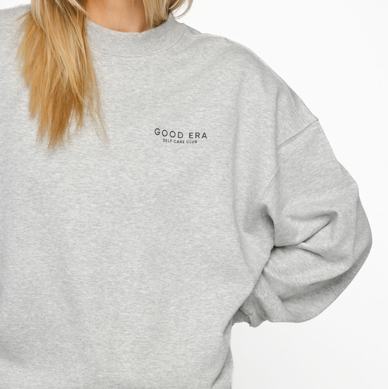 Gray sweatshirt with 'GOOD ERA' text on a white background