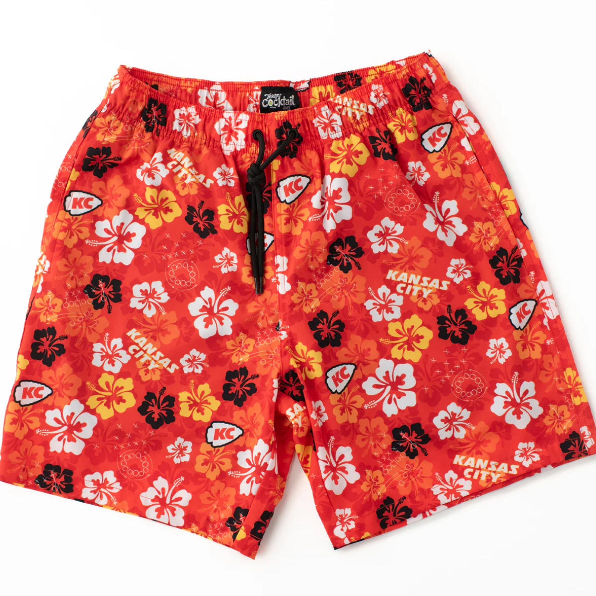 Red floral-patterned shorts with 'Kansas City' text on a white background
