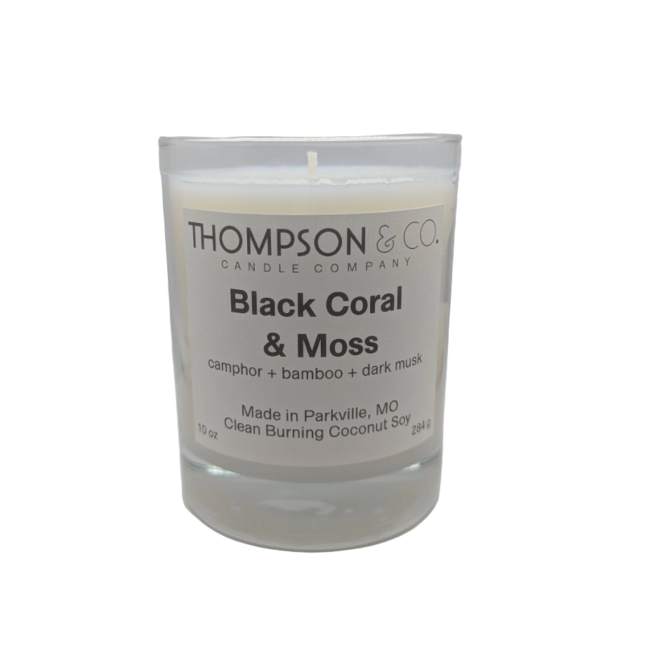 Thompson & Co candle labeled 'Black Coral & Moss' on a white background