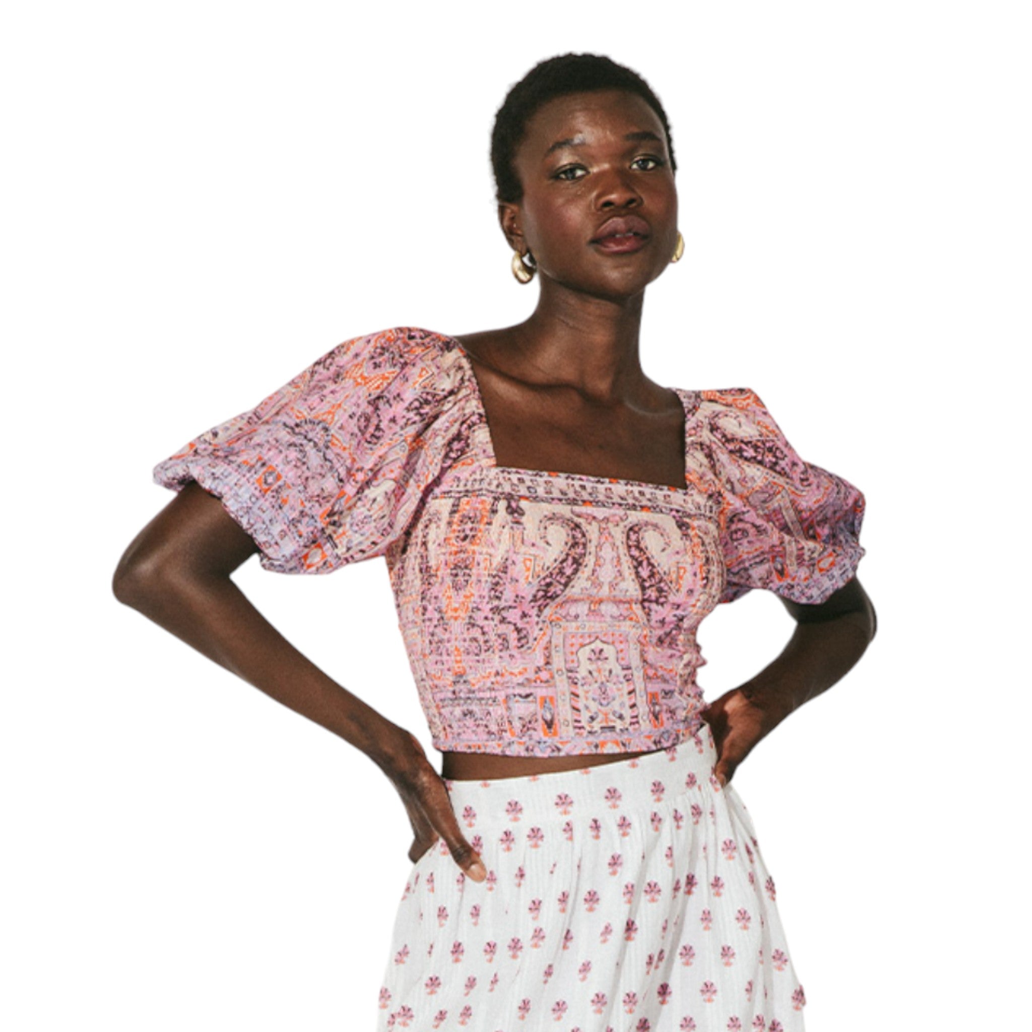 square neck, short puff sleeve crop top featuring a bohemian take on a maroon, pink, orange, and cream paisley print