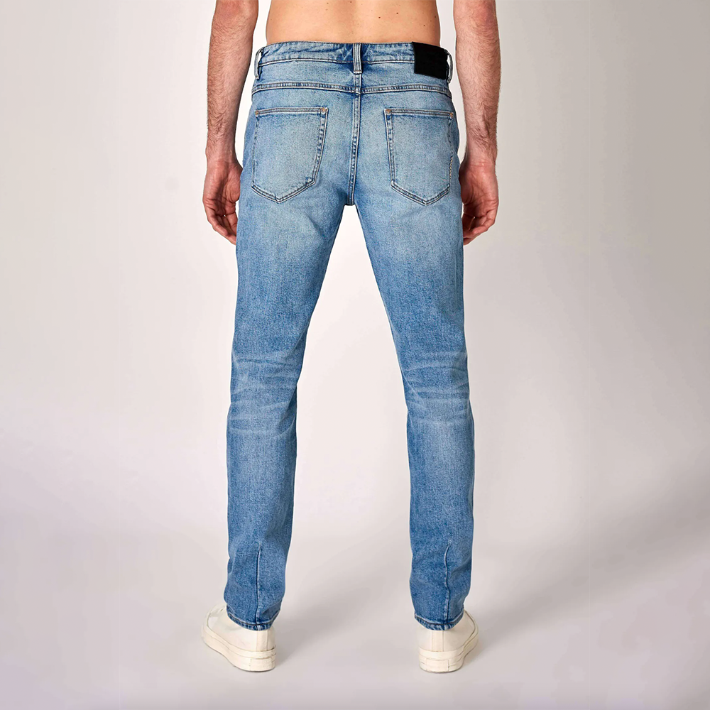 Blue fitted denim with button and zip closure and two back pockets