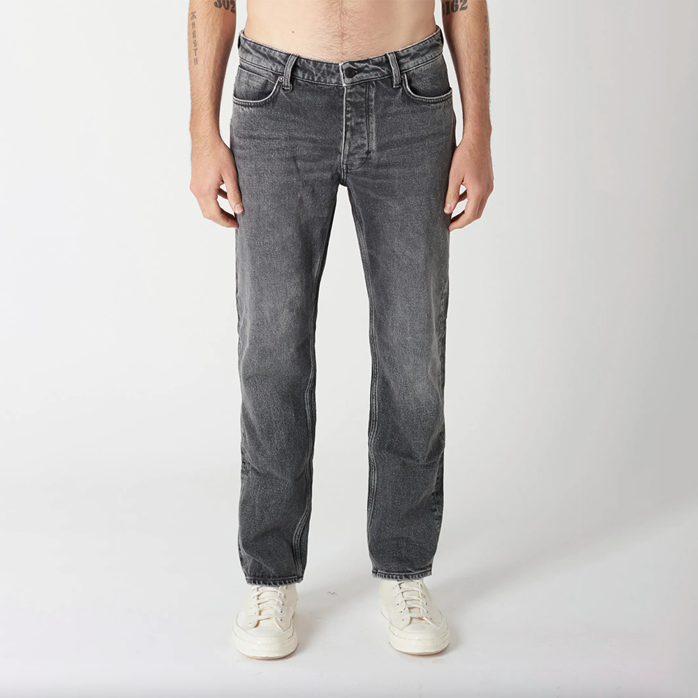 Dark wash fitted denim with button and zip closure