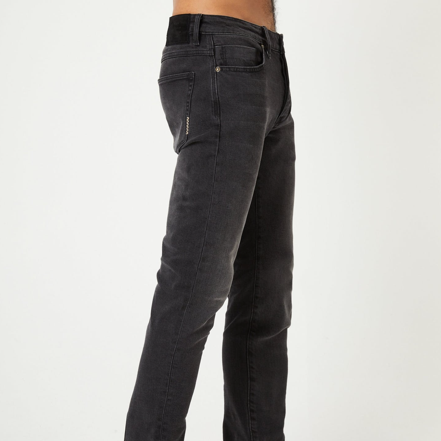 Dark slim fitting denim with button and zip closure