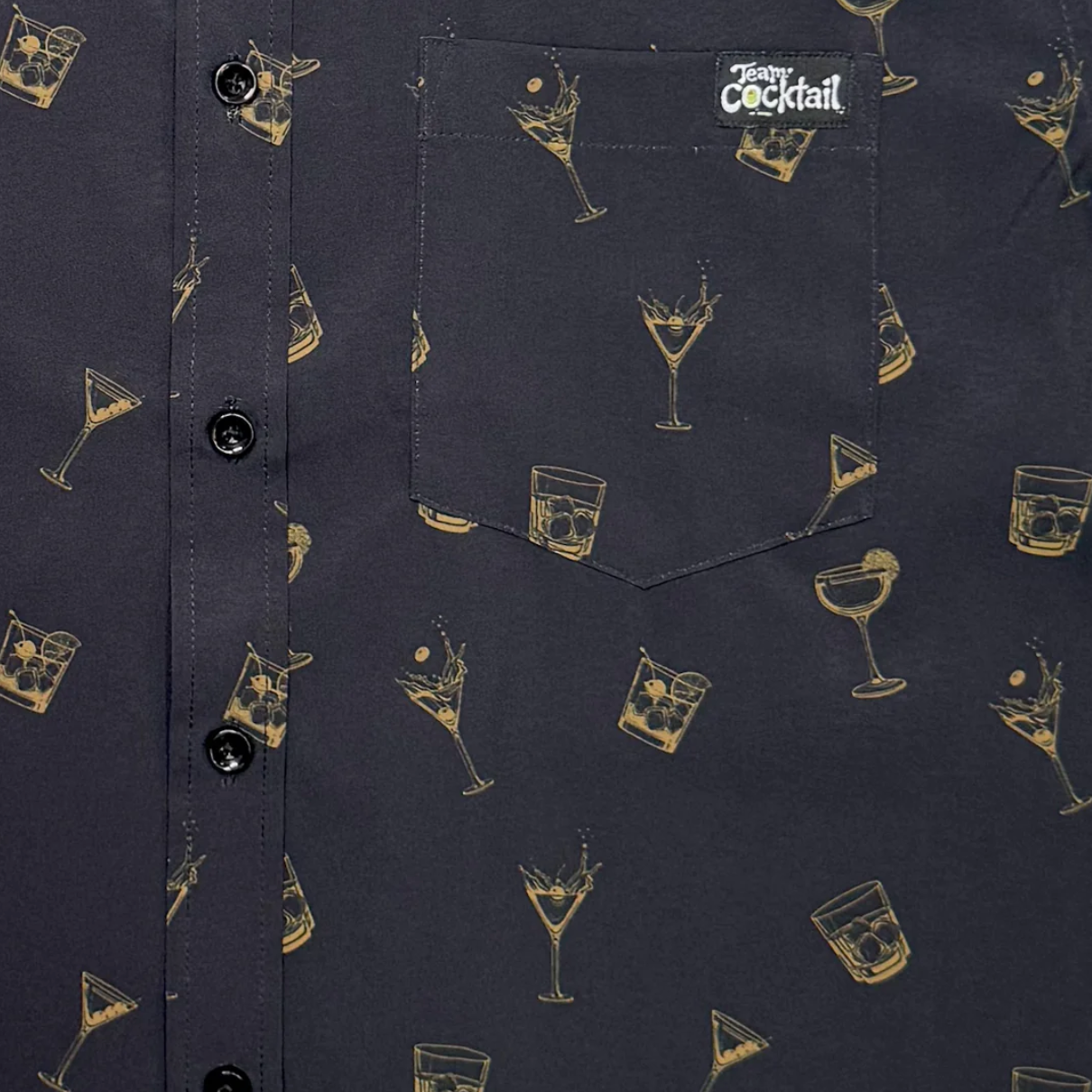 Black shirt with gold cocktail pattern and 'Beverly Cocktail' label.