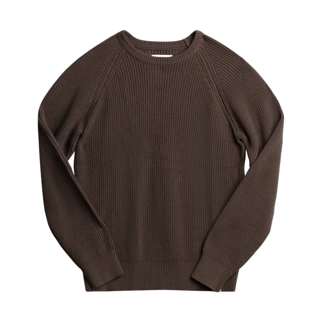 Brown ribbed sweater on a white background