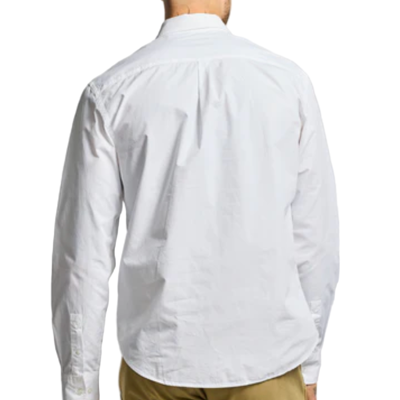 White shirt worn by a person on a white background