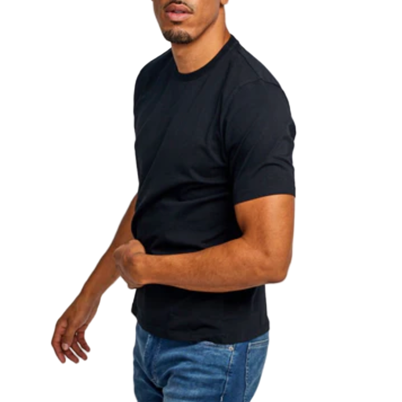 Man wearing a black t-shirt and blue jeans on a white background