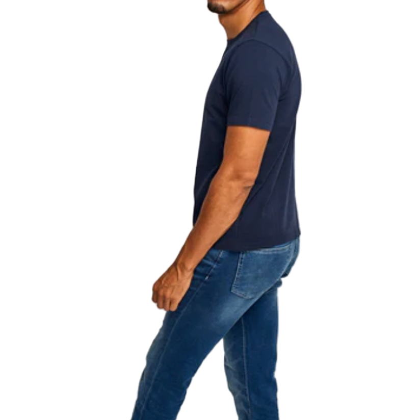 Person wearing a navy t-shirt and blue jeans on a white background