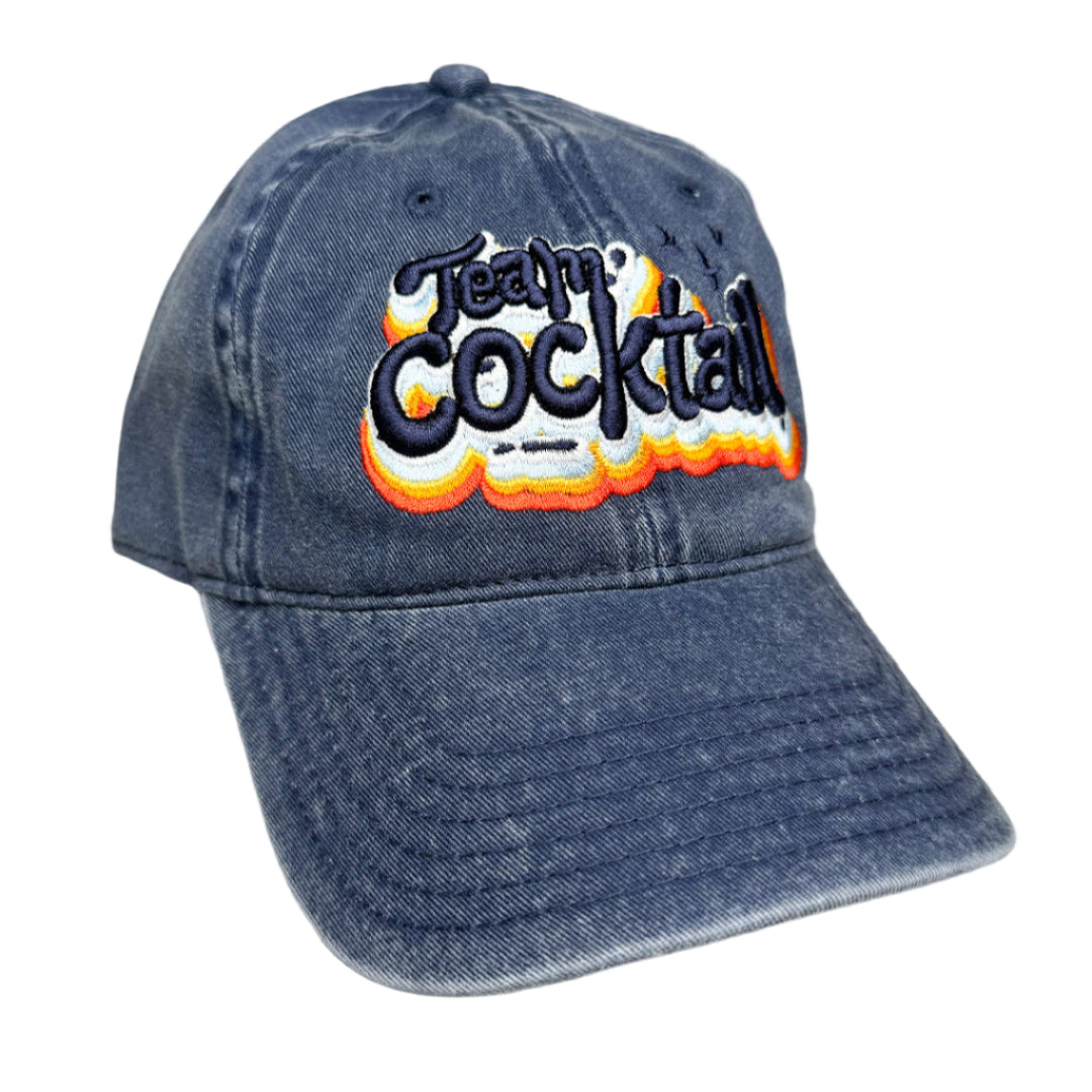 Blue denim cap with 'Tequila Cocktail' text on a white background