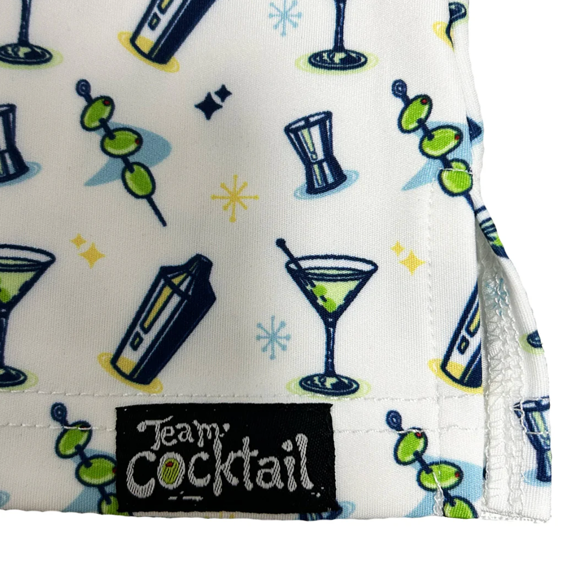 Fabric with cocktail-themed design and 'Team Cocktail' label on a white background