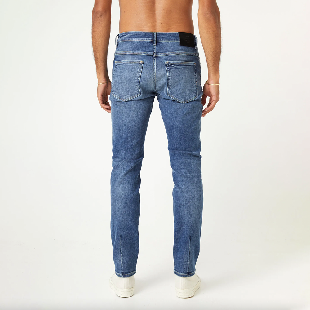 Blue fitted denim with button and zip closure and two back pockets