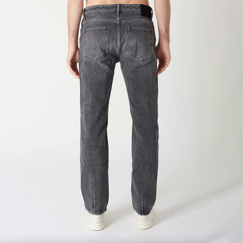Dark wash fitted denim with button and zip closure